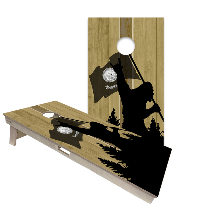 World Series of Cornhole Official 2' x 4' Professional Cornhole Board Runway 2402P - Sasquatch Holding an Idaho Flag