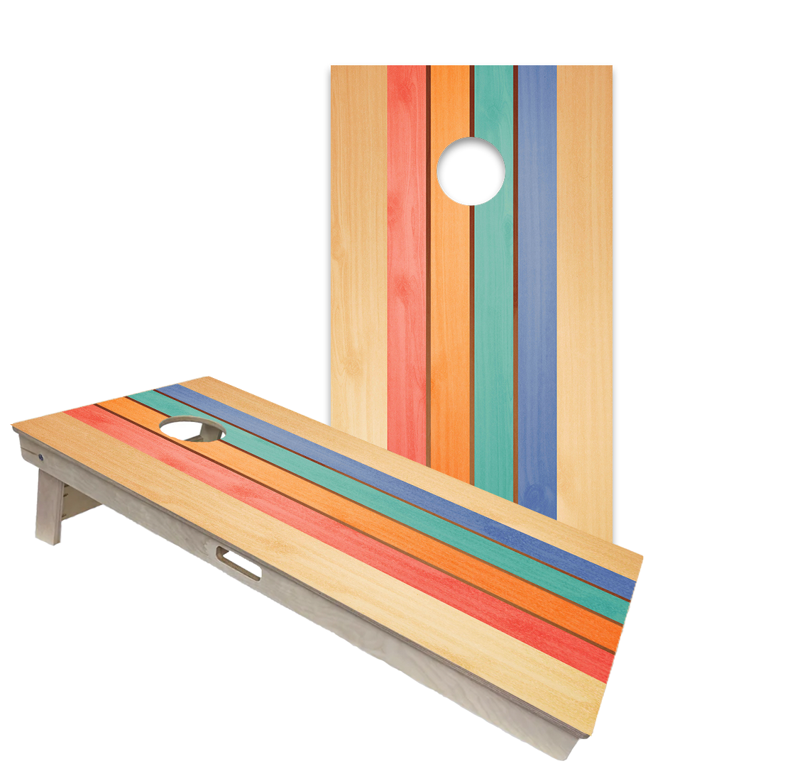 Retro and vintage-inspired cornhole boards with striped, colorful and woodgrain designs in a game room