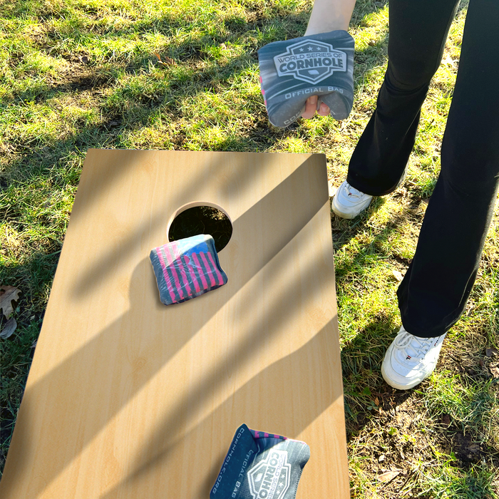 World Series of Cornhole Lightweight Cornhole Set - Light Woodgrain Boards with Red and Blue Bags