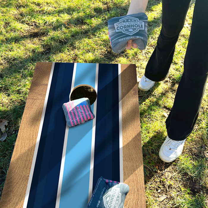 World Series of Cornhole Lightweight Cornhole Set - Navy and Baby Blue Stripes Boards with Navy and Turquoise Bags