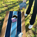 World Series of Cornhole Lightweight Cornhole Set - Navy and Baby Blue Stripes Boards with Navy and Turquoise Bags