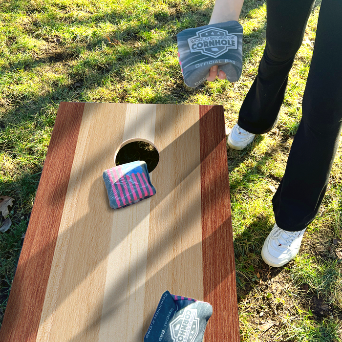 World Series of Cornhole Lightweight Cornhole Set - Alternating Wood Tones Boards with Red and Royal Blue Bags