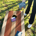 World Series of Cornhole Lightweight Cornhole Set - Alternating Light and Dark Wood Tones Boards with Red and Royal Blue Bags