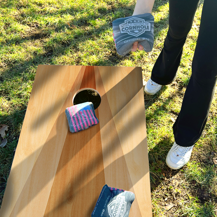 World Series of Cornhole Lightweight Cornhole Set - Wood Triangle Boards with Red and Royal Blue Bags