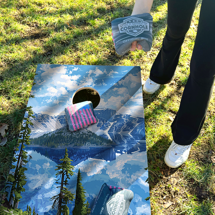 World Series of Cornhole Lightweight Cornhole Set - Crater Lake National Park Daytime Boards with Red and Royal Blue Bags