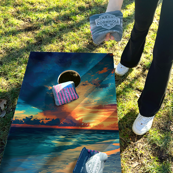 World Series of Cornhole Lightweight Cornhole Set - Gulf Shores National Park Daytime Boards with Red and Royal Blue Bags