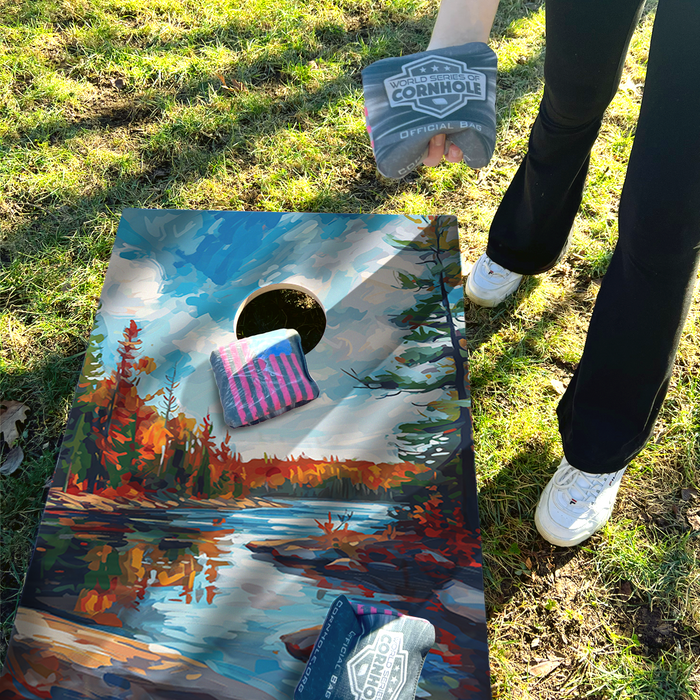World Series of Cornhole Lightweight Cornhole Set - Voyageurs National Park Daytime Boards with Red and Royal Blue Bags