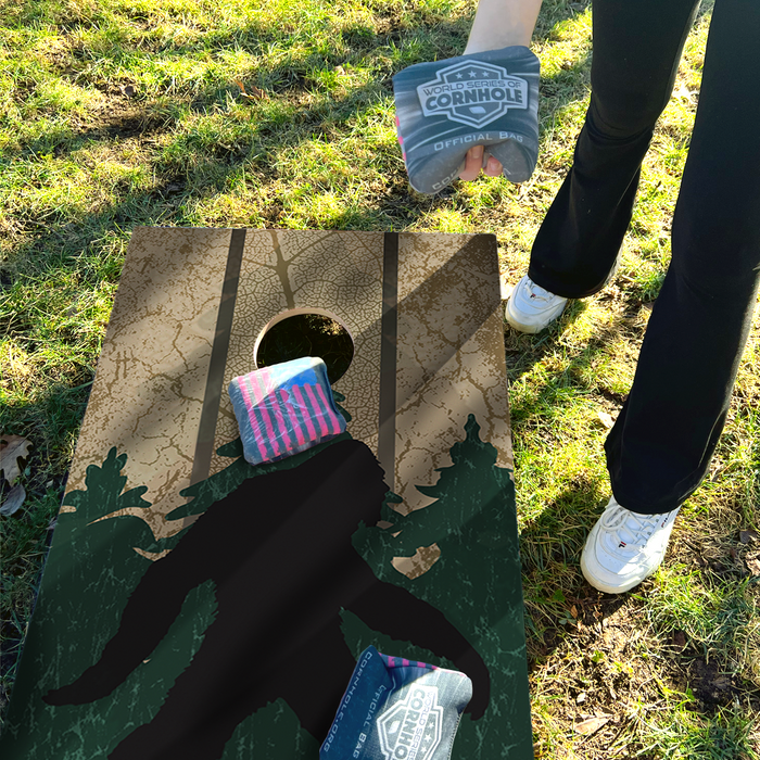 World Series of Cornhole Lightweight Cornhole Set - Wilderness Sasquatch Boards with Red and Royal Blue Bags