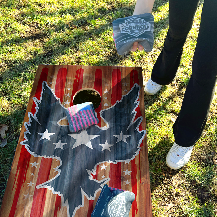 World Series of Cornhole Lightweight Cornhole Set - Stars and Stripes Eagle Boards with Red and Blue Bags