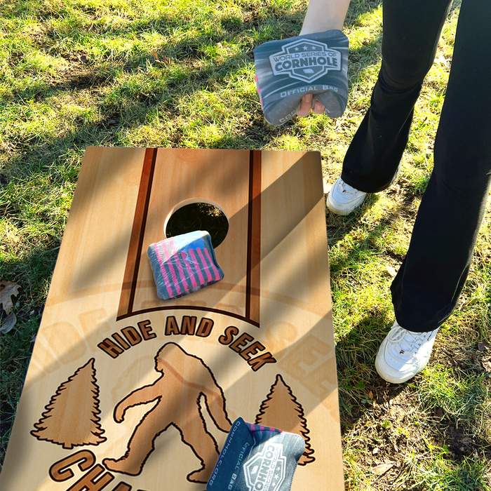 World Series of Cornhole Lightweight Cornhole Set - Hide and Seek Sasquatch Boards with Red and Royal Blue Bags