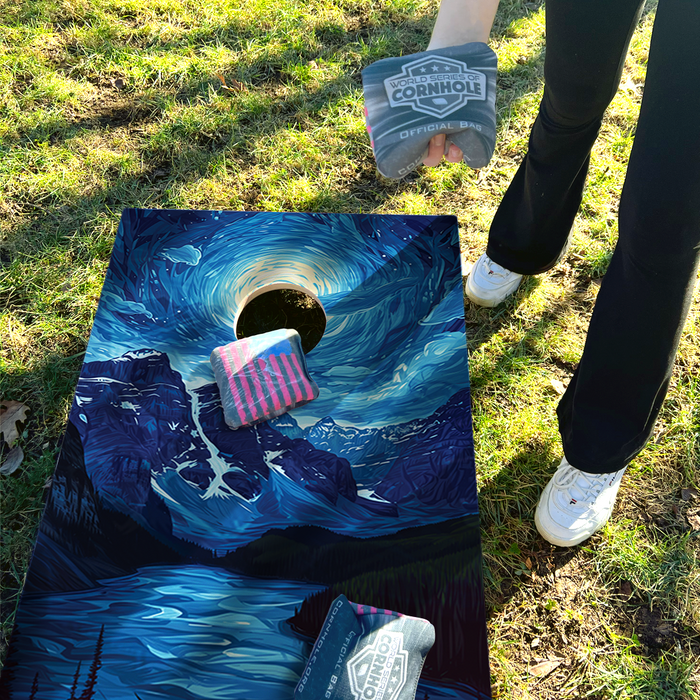 World Series of Cornhole Lightweight Cornhole Set - Glacier National Park Nighttime Boards with Red and Royal Blue Bags