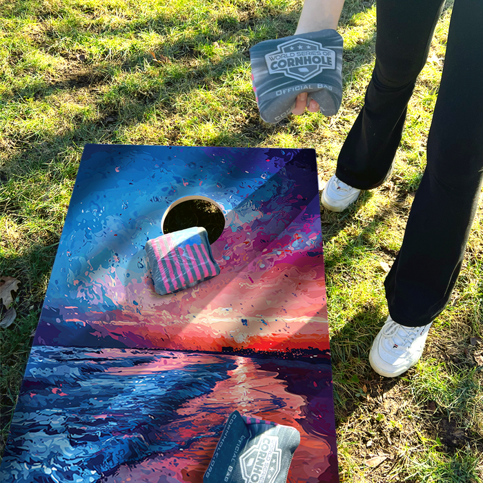 World Series of Cornhole Lightweight Cornhole Set - Gulf Shores National Park Nighttime Boards with Red and Royal Blue Bags