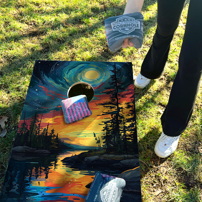 World Series of Cornhole Lightweight Cornhole Set - Voyageurs National Park Nighttime Boards with Red and Royal Blue Bags