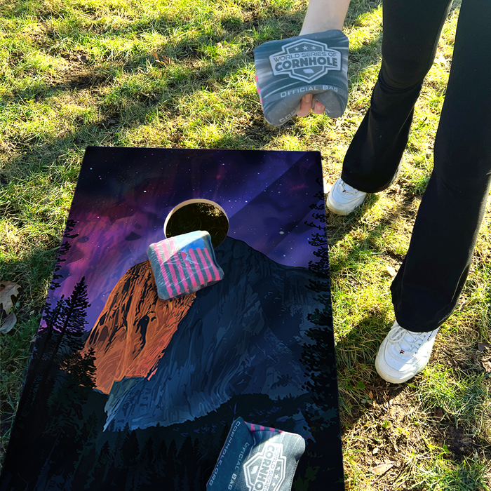 World Series of Cornhole Lightweight Cornhole Set - Yosemite National Park Nighttime Boards with Red and Royal Blue Bags