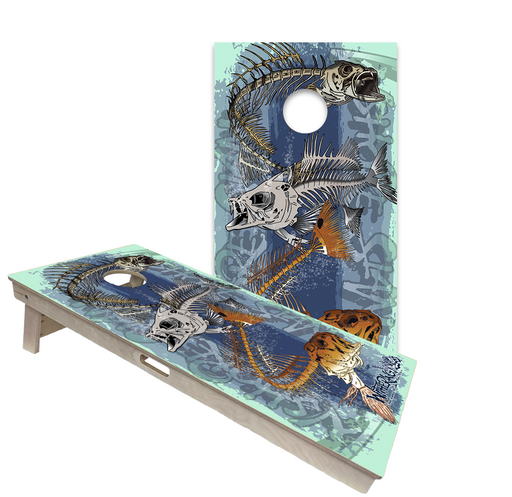 Hunting and fishing cornhole boards with bass, deer and camouflage designs at an outdoor cabin
