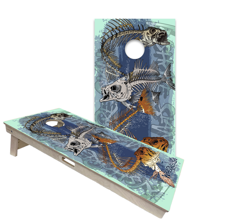 Hunting and fishing cornhole boards with bass, deer and camouflage designs at an outdoor cabin
