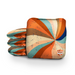 Retro and vintage-inspired cornhole bags beside a regulation board in a colorful game room
